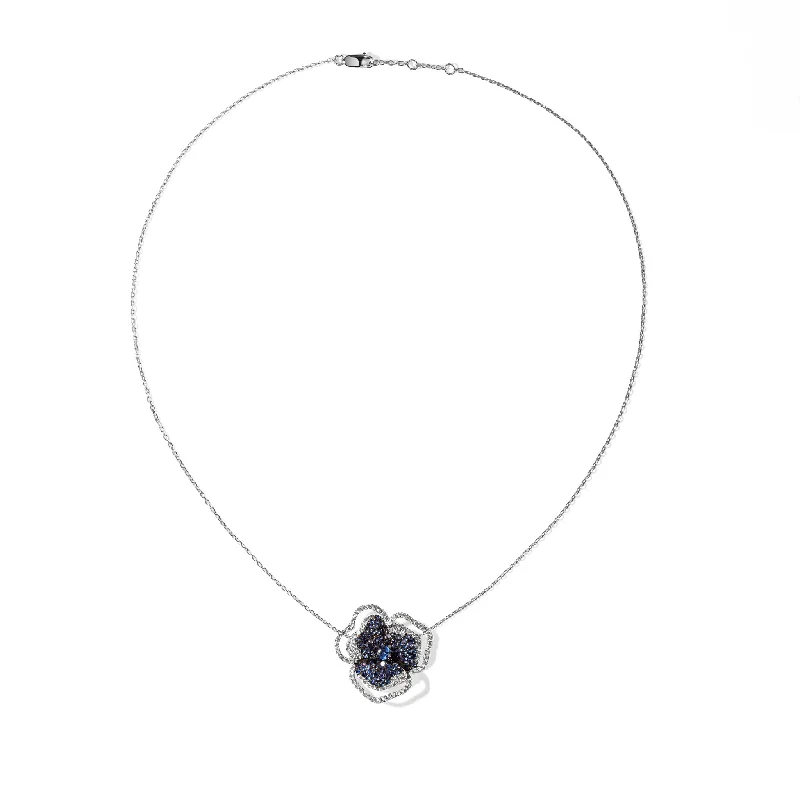 Shop Handcrafted Jewelry At Special Promotional Rates Bloom Small Flower Halo Blue Sapphire Necklace in White Gold Shop Handcrafted Jewelry At Special Promotional Rates Bloom Small Flower Halo Blue Sapphire Necklace in White Gold